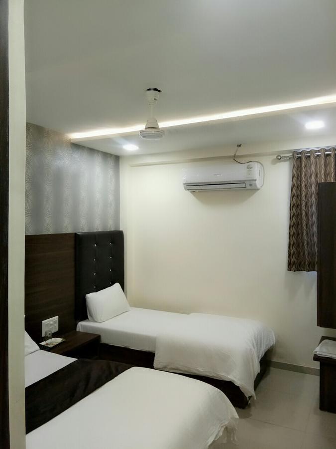 أحمد أباد Hotel Sun Shine المظهر الخارجي الصورة